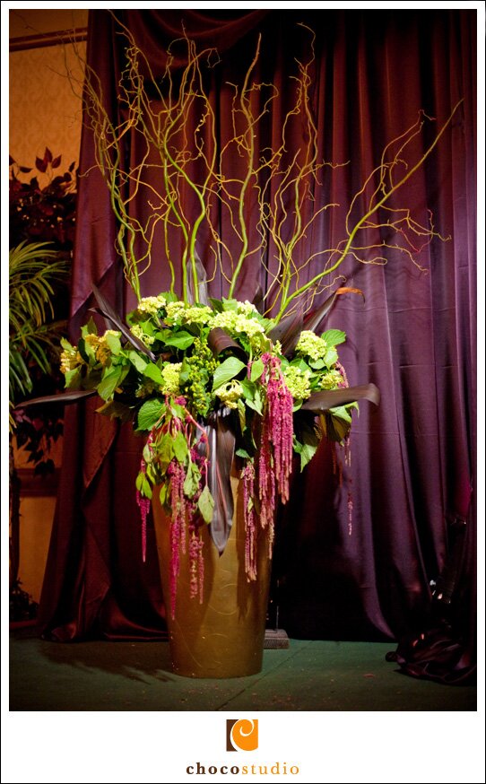 Giant vase with flowers at wedding