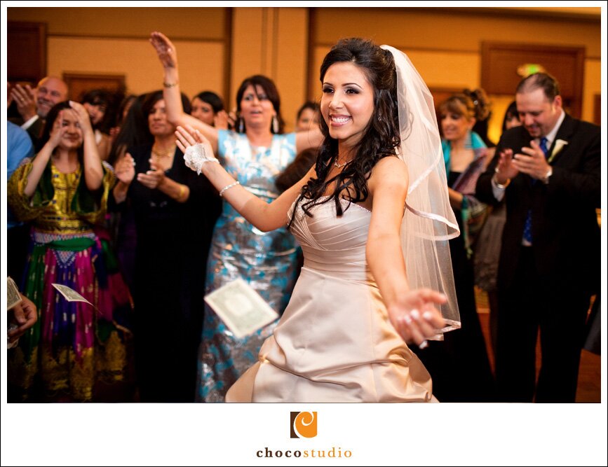 bride and groom dancing at Afghan wedding reception at Fremont Marriott