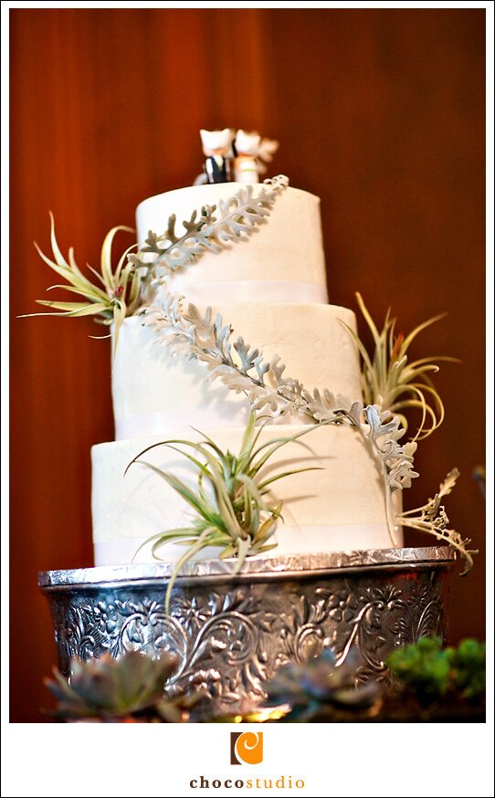 Wedding cake with custom decorations and cake stand