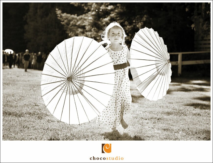 Playing on the Meadow with Parasols