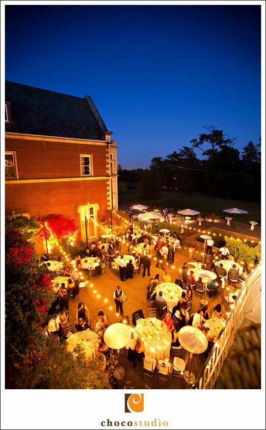 Outdoor evening wedding reception at Kohl Mansion at Dusk