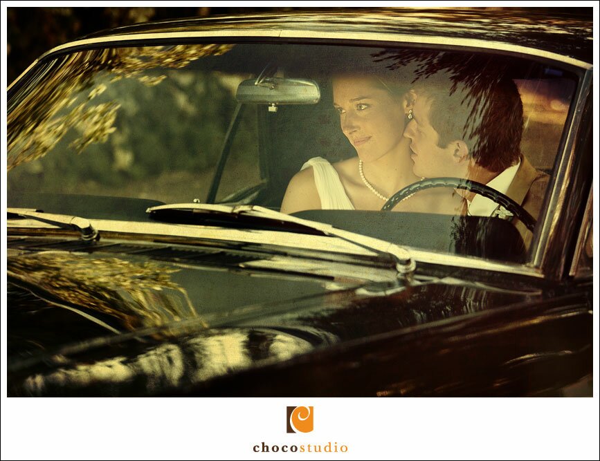 Portrait of Bride and Groom in a Car