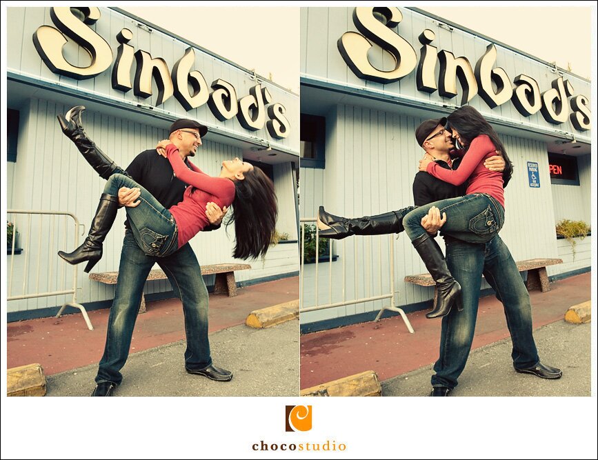 Engagement photo in front of Sinbad's in SF